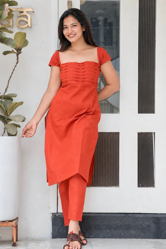 Anaykaa Rati Cotton Kurta Set in rust orange with gathered bodice and straight pants
