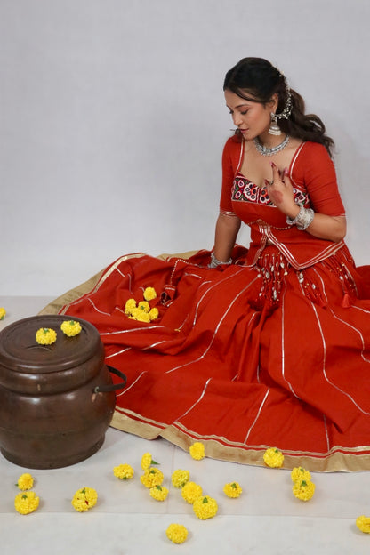Rust Orange cotton chaniya choli with traditional Kutchi detailing