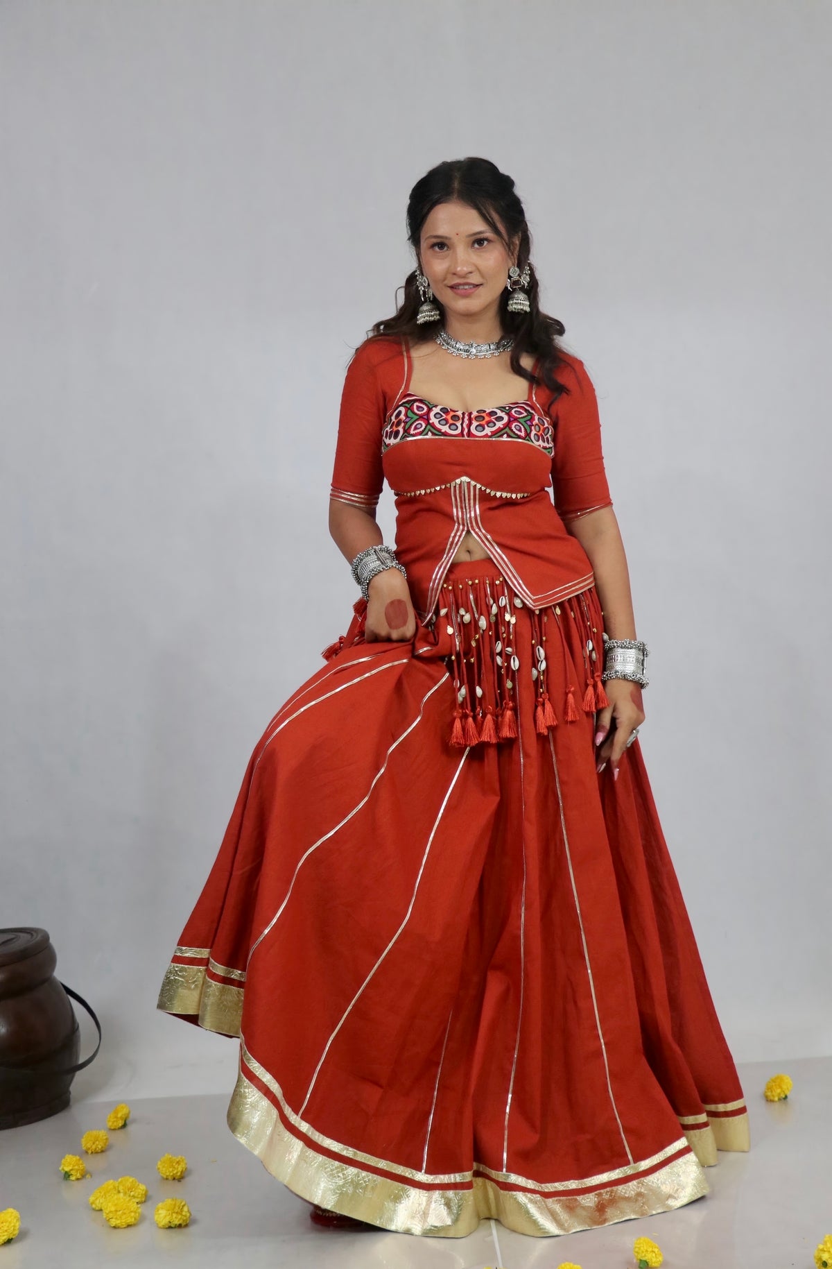 Rust Orange flared chaniya with Kutchi embellishment